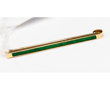 One 15ct gold bar brooch with green enamel detail brooch length 5cm long, with a total gross weight approx 2.8gms