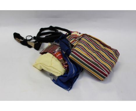 A collection of far eastern items to include a kaftan, striped in yellow and maroon and a deep blue and grey striped and othe