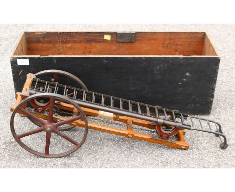 Working Model: A late 19th Century scale model of a fire ladder or model escape ladder cased within a pine wooden box, 70cm l