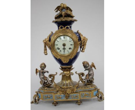 Italian reproduction brass and blue enamel mantle clock with Lion head and cherub decoration (1) (af) 