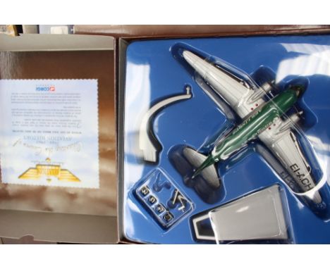 A collection of unboxed Burago vehicles in two boxes and five Corgi AViation Archive boxed planes. (three)