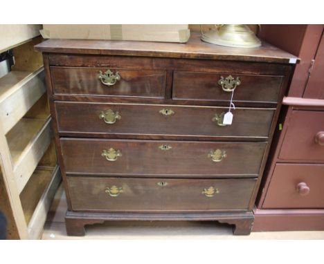 A George III mahogany chest of drawers, comprising two short over three long graduated drawers, raised on bracket feet