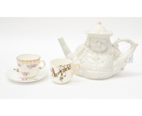 A 19th Century teapot, Staffordshire Toby character, a circa 1870s cup and saucer and another cup 