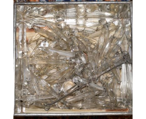 A tin of cut glass chandelier (or luster) droppers 