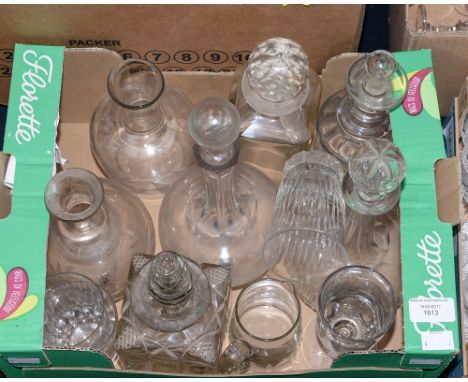 A box containing a collection of 19th century glass, including a George IV cut glass decanter, three globe decanters, and ear