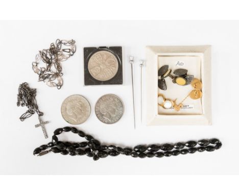 Two Five Pound cupro nickel coin and a Crown, a white metal cross and chain, silver necklace, a pair of silver engraved cuffl