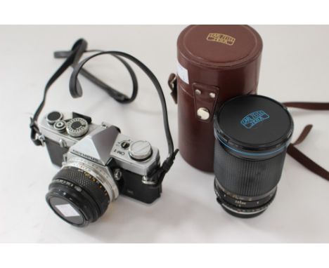 Olympus OM-1 camera together with Olympus Zeiss telephoto lens in case