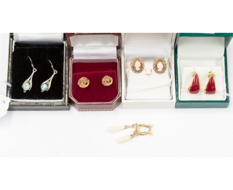 Four pairs of earrings comprising of one 9ct gold rope studs, one yellow metal and cameo studs, a stamped 925 pair of drop ea