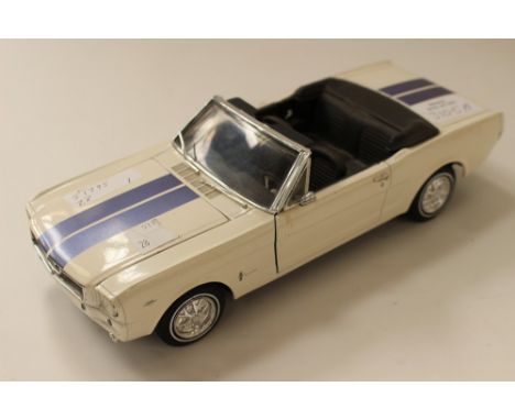  A model of a 1965 Mustang car, made in 1993, to a 1.18 scale, Revell
