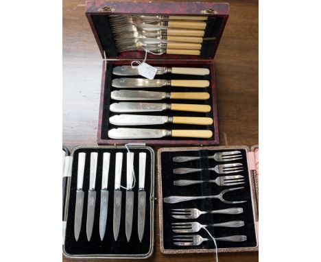 Six cased fruit knives with Mother of Pearl handles, a cased set of EPNS cake forks an serving fork and cased fish eaters 