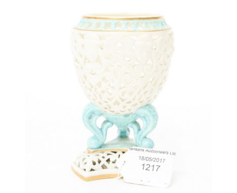 A Royal Worcester Grainger and Co small reticulated three footed vase with turquoise rim and feet, shape no. 307, date code f