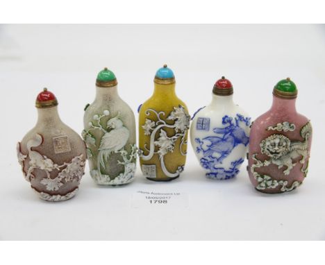 Chinese snuff bottles five examples, decorated with birds, insects and Kylin, three with pseudo seal marks, tallest 8.5 cms 