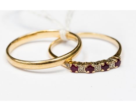 A 9ct gold 3mm plain wedding band, size Z +1, approx 2.6gms together with a 9ct four stone ruby and diamond half eternity sty