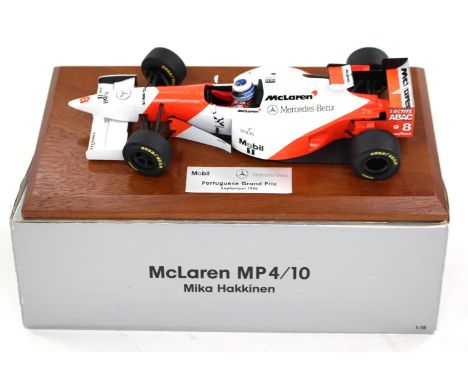 Minichamps: A rare Mobil 1 Portuguese Grand Prix Mika Hakkinen 1996 1/18 scale model #8 McLaren MP4/10 car produced as gifts 