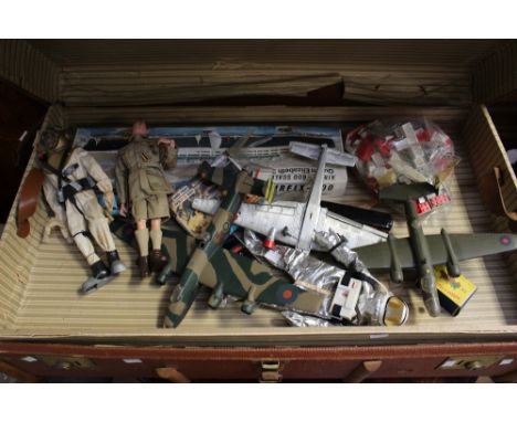 A collection of toys to comprise: boxed Airfix, unboxed made planes, modern Action Man, and others various, all contained wit