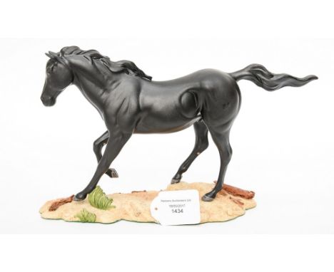 A Royal Doulton horse, black matte glaze, on beach effect ceramic glaze, with box