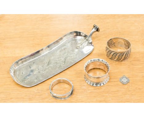 An electroplated crumb tray a/f, with one hallmarked napkin ring and two electroplated napkin rings and silver medallion.