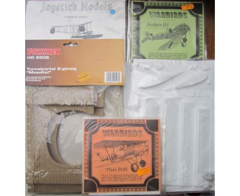Plastic and metal items.
&nbsp;
Also includes tools and accessories for model making.