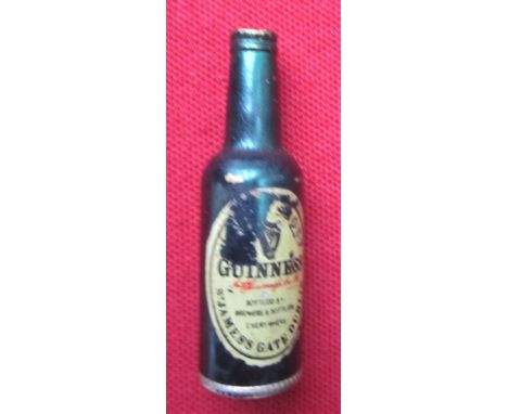 The lighter fit's in to the bottom of the bottle.&nbsp;
Bottle rubbed.