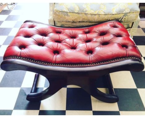 Vintage Chesterfield foot stool in the style of a regency gout stool.&nbsp;Genuine red leather deep button upholstery, mahoga