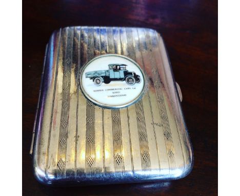 A collectable 1950s, engine turned, silver plated cigarette case with a&nbsp;seluloid insert advertising "MORRIS COMMERCIAL C