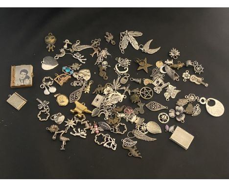A selection of assorted vintage pendants etc 