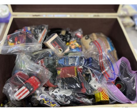 A Haute Couture suitcase and contents of assorted die-cast and other models 