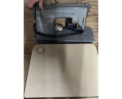 A vintage singer sewing machine, shipping unavailable
