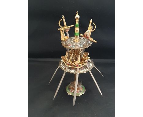 A novelty Toledo sword cocktail stick set 