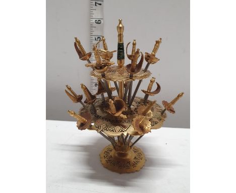 A novelty Toledo sword cocktail stick set 