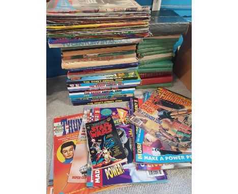 A job lot of vintage annuals, comics and books etc, shipping unavailable