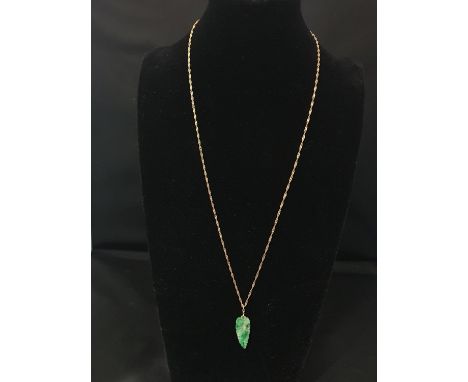 A 9ct gold chain and Jade pendant (chain weight 2.23g) 