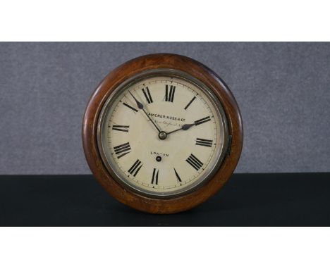 A 19th century mahogany cased dial clock, painted white dial with Roman numerals marked Camerer.Kuss&amp;Co, 56, New Oxford S