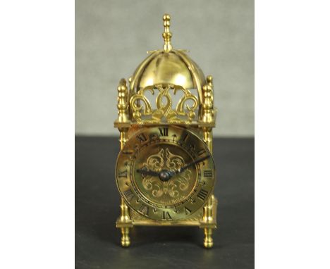 A mid 20th century Smith's brass lantern clock, with an 8 day jewelled movement, stamped Smith's Clocks &amp; Watches Ltd. H.