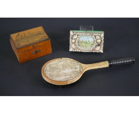 A collection of curiosities, including a present from Brighton shell covered trinket box, a scrimshaw ware veneered box and a