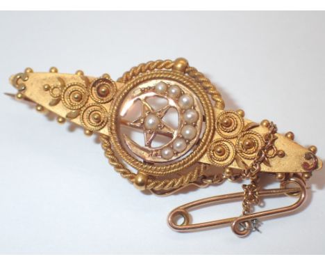 15ct yellow gold and seed pearl Edwardian brooch with unusual star and crescent moon decoration 3.95g