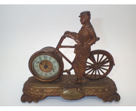 Brass cycling clock c1920 CONDITION REPORT: This item is working at lotitng.