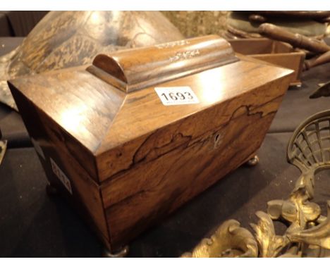 Sarcophogus shaped tea caddy with two compartments and non original mixing bowl on bun feet