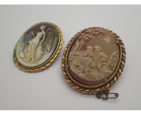 Two yellow metal cameo brooches one mother of pearl