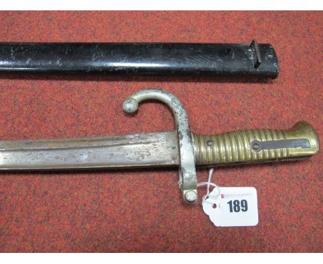 A French 1866 Chassepot Bayonet, light pitting on the blade, brass hilt, dated 1870 with makers name on back of blade, in bla