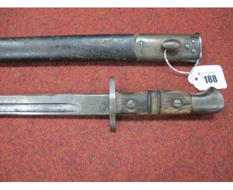 A WWI Bayonet for the P1914 Rifle, made by Remington 1913, the blade with light rusting and stamped with makers name, wooden 