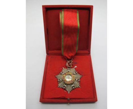 A XIX Century Turkish Order of the Medjidie, in gold, silver and enamel, as awarded to British Officers, in it's later fitted