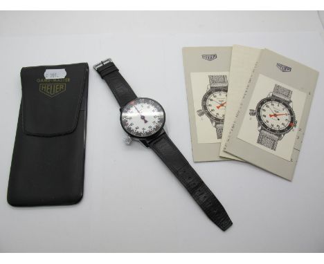 A Military Stop Watch Timer by Heuer, on leather strap, with case, box and instructions, the back of case stamped 4-2/0110 62