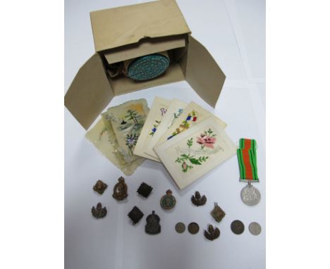 Seven WWI Silk Postcards, four plastic cards, a WWI Defence Medal, Women's Land Army lapel badge, a R.A.M.C brass cap badge, 