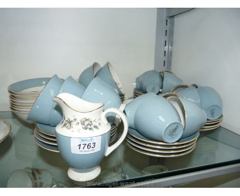 A Royal Doulton 'Rose Elegans' part coffee and tea service including; 12 coffee cups, 12 saucers, 5 tea cups, 8 saucers, 8 te