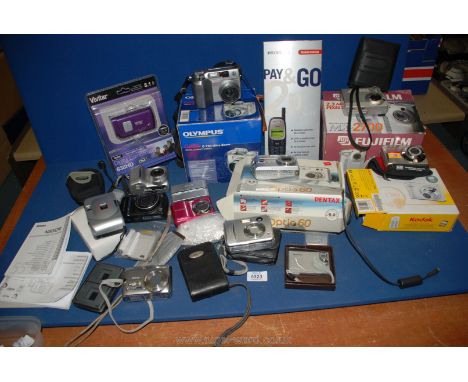 A box of digital Cameras including Olympus, Fuji Nikon, Kodak easy share (boxed), etc.
