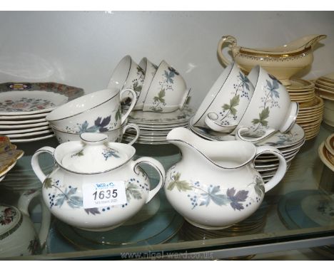 A 20th c. Royal Doulton part Teaset in Burgundy pattern to include cups, saucers, plates, milk jug, sugar basin etc. (25 piec