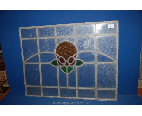A stained glass panel; small crack to pane. 20 1/4" x 26 1/4".