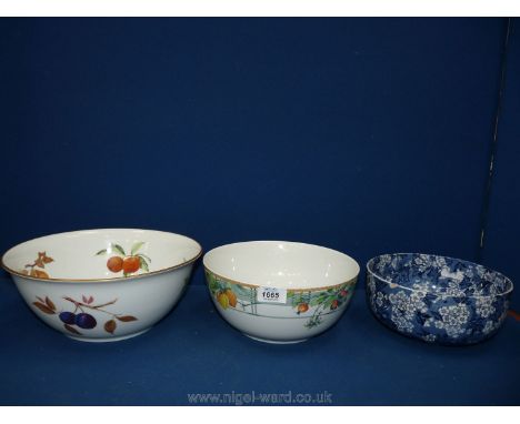 Three large fruit Bowls including Royal Worcester 'Evesham', Wedgwood 'Eden' and floral blue and white, (chip to rim).
