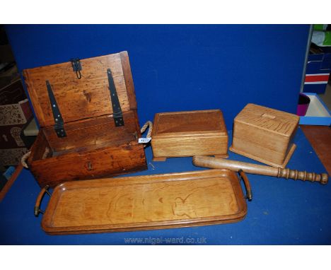 An Oak tea Caddy with carved roundel E J &amp; Co., Oak jewellery box, tea tray, truncheon and Pine box with rope handles